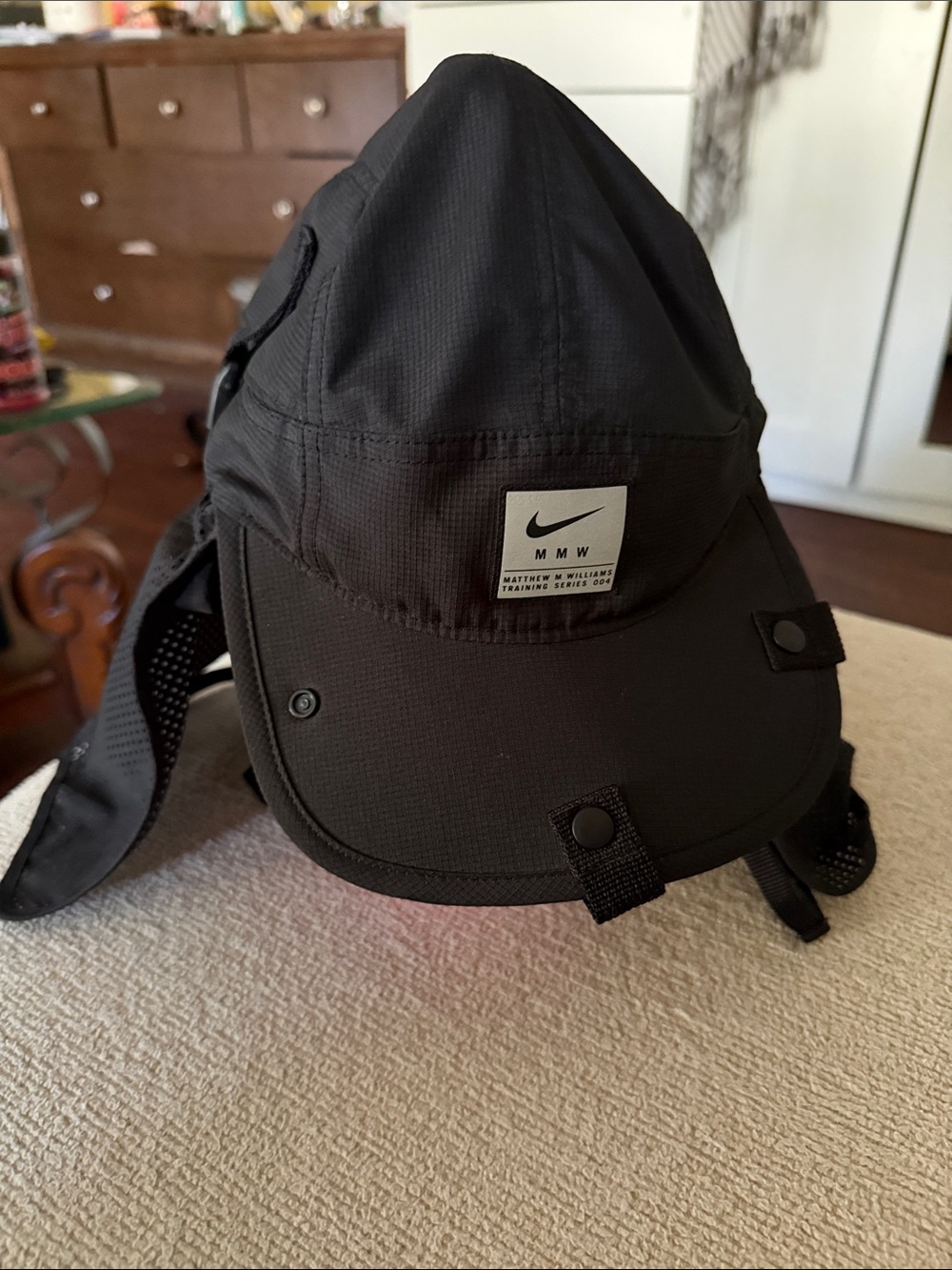 Nike MM W Black Cap-Style Men’s Bag with Branded Patch